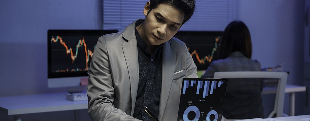 man-analyzes-charts-and-graphs-in-an-office-2026-09-23-21-24-55-utc